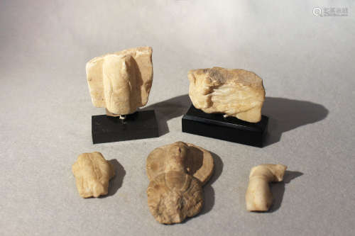 Five Chinese white marble fragments of Buddhist steles, largest 12.5cm