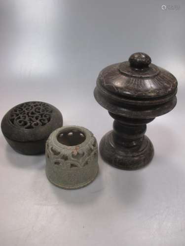 A Chinese carved black stone censer and cover in archaic style, scroll pierced cover, and incised