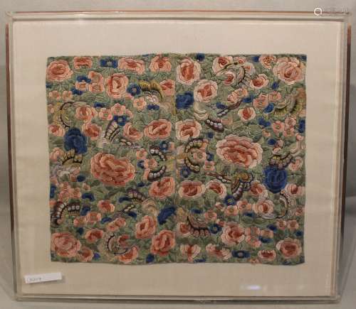 A Chinese embroidered silk panel, Qing Dynasty, late 19th century, worked with butterflies amongst