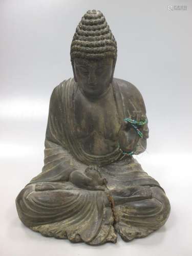 A wooden buddha, 20th century, 38cm high