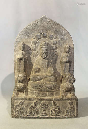 A Chinese grey stone Buddhist triad stele with aureole, in Wei Dynasty style, 25.5cm high