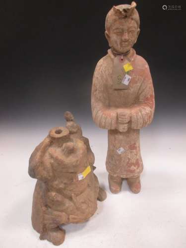 Two Chinese painted pottery figures, a standing figure of a guard, Han type, 57cm high; and a