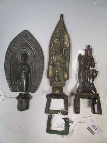 Three Chinese bronze and gilt bronze standing Buddha figures, in Northern Wei Style, the tallest