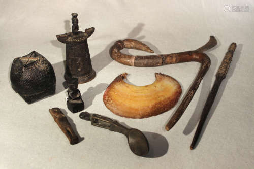 A group of eleven Indonesian and other tribal items and artefacts, including a Philippines (North