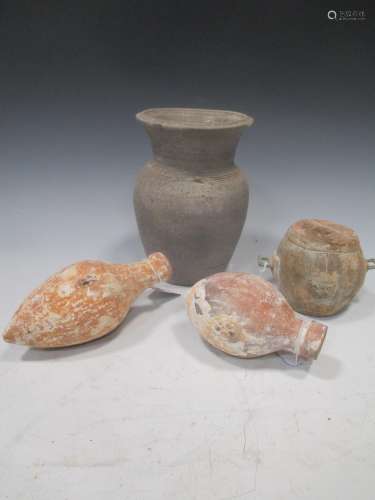 Two egg form pottery “Pilgrim” flasks, perhaps Romano-Syrian, one with lugs for straps, with