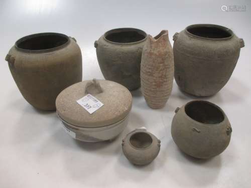 Seven Chinese ceramic small vessels, Han Dynasty, 10th century, including five graduated 