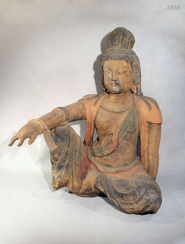 A Chinese carved and polychrome painted wood seated figure of Guanyin, in Song Dynasty style,