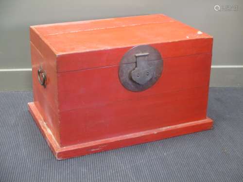 An oriental red lacquered chest, perhaps Korean, and a Tibetan document box, 20th century, painted