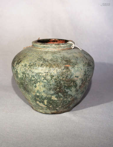 A Chinese green glazed pottery, shouldered vase, probably Han Dynasty, 19cm high