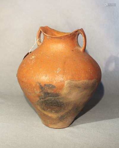 A Chinese red pottery shouldered vase with cusped rim and neck handles, possibly Neolithic, 27.5cm