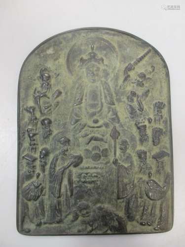 A Chinese bronze Buddhist plaque, arched rectangular, probably 19th century cast in low relief