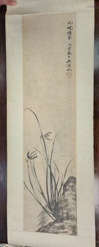 A Chinese Scroll Painting, Late Qing Dynasty/early 20th century, painted with flowering orchids