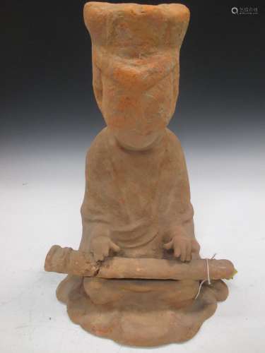 A Chinese red pottery, Seated musician. Han type, 36cm high