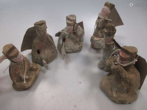 A group of six Chinese painted pottery tomb figures of musicians and entertainers, Han Dynasty,