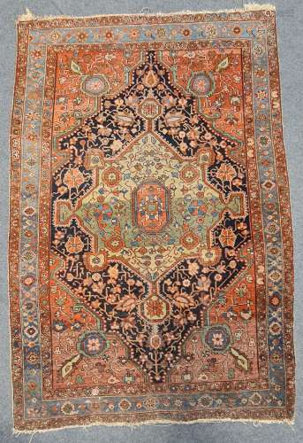 A small Persian rug with central medallion 155 x 100cm