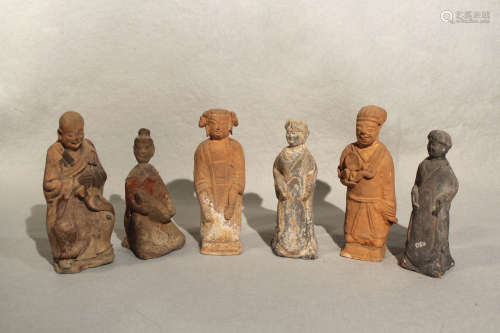 Six Chinese pottery figures, Han Dynasty or later, some with painted detail, tallest 15.5cm high