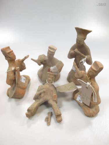 A group of five Chinese pottery musician and entertainer tomb figures, perhaps Han Dynasty,