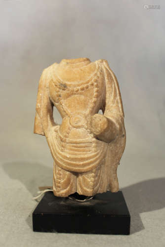 A Chinese white marble fragmentary torso of Avalokiteshvara, in 6th/7th century style, 12.5cm high