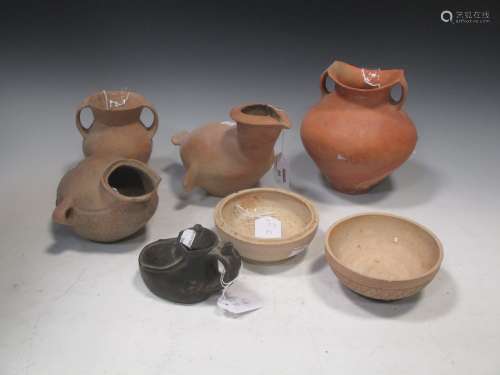 A group of six Chinese neolithic ceramic vessels, including a red pottery two-handles jar, Siwa