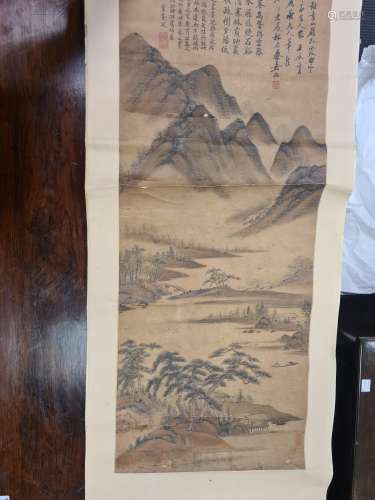 A Chinese scroll painting, Qing Dynasty, depicting scholars in a pavilion in a vast mountain