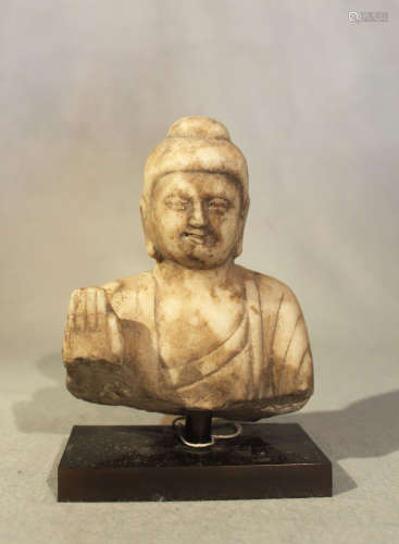 A Chinese white marble Buddha head and shoulders, in Northern Qi style,16cm high