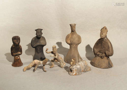 A Group of seven Chinese pottery tomb figures, of diverse type including dancers and entertainers,