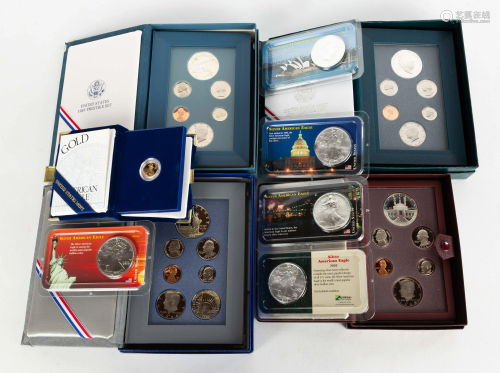 4 U.S. Mint Prestige Sets, 4 Silver Dollars & Gold Coin