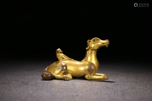 A Gilt-bronze beast statue