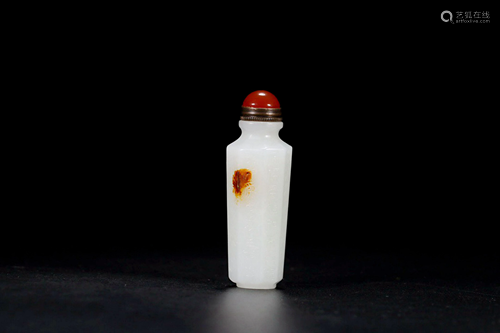 A White Jade Snuff Bottle