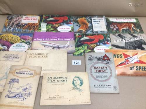 A QUANTITY OF CIGARETTE CARDS IN BOOKS, WINGS ACROSS THE WORLD, SAFETY FIRST AND MORE