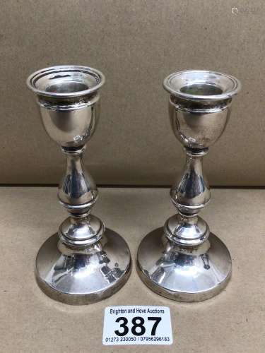 PAIR OF HALLMARKED WEIGHTED SILVER CIRCULAR BALUSTER CANDLESTICKS LONDON EDWARD BARNARD AND SONS