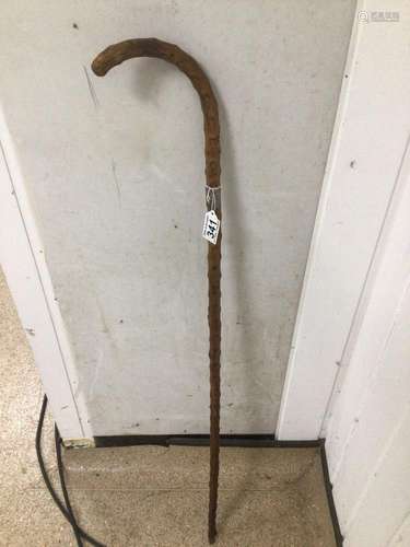 A LATE 19TH CENTURY HAWTHORN WALKING CANE WITH SILVER BAND