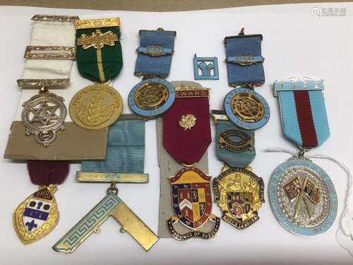 A QUANTITY OF MASONIC MEDALS WITH RIBBONS SOME SILVER WITH GOLD GILT