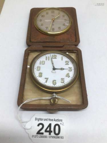 A IMHOF SWISS ALARM TRAVEL CLOCK WITH ANOTHER CLOCK