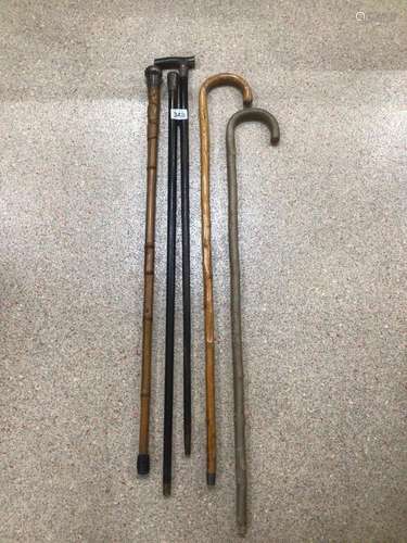 FIVE EARLY WALKING CANES/STICKS THREE WITH SILVER COROMANDEL, CANE, HORN