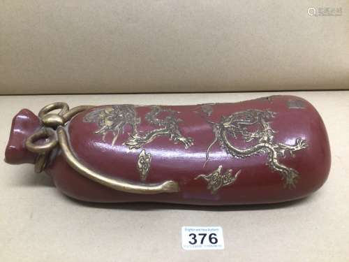A RED PORCELAIN CHINESE PILLOW DECORATED WITH GILT DRAGONS 31 X9CM