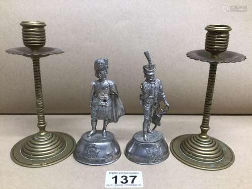 A PAIR OF EDWARDIAN BRASS CANDLESTICKS 15CM WITH TWO PEWTER MILITARY FIGURES 1CM ONE BY C. STADDEN