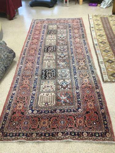 A LARGE WOOL RUG / CARPET FROM IRAN QUM 323 X 124 CM