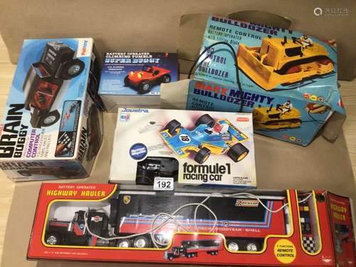 A COLLECTION OF VINTAGE REMOTE CONTROLLED TOY VEHICLES IN ORIGINAL BOXES, INCLUDES A MARX MIGHTY