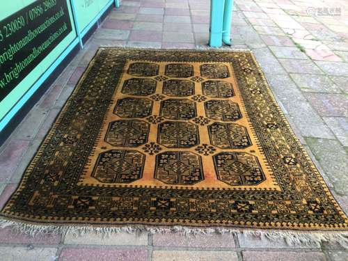 A VINTAGE AFGHAN WOOL RUG/CARPET 292 X 202CM