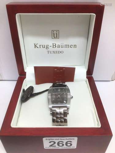 A BOXED WITH PAPERS GENTS STEEL KRUG BAUMEN TUXEDO WATCH