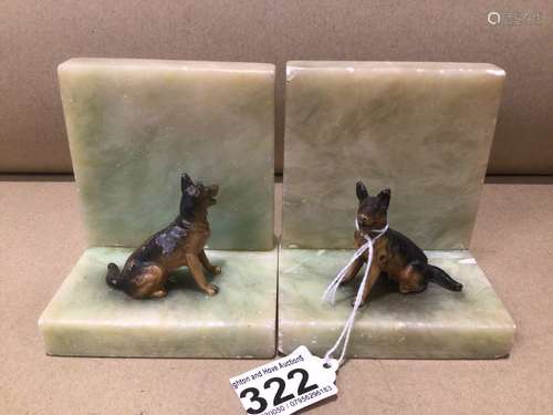 A PAIR OF ONYX BOOKENDS WITH STATUES OF DOGS