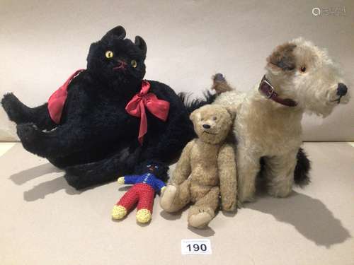 A SMALL COLLECTION OF VINTAGE SOFT TOYS/ANIMALS. THE DOG IS LABELED 