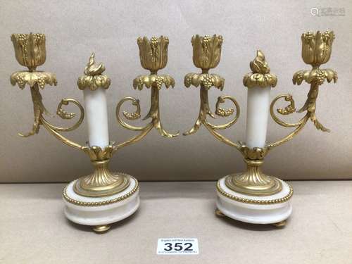 A PAIR OF WHITE MARBLE AND BRONZE GILT CANDELABRAS ON GILT FEET 20 CM