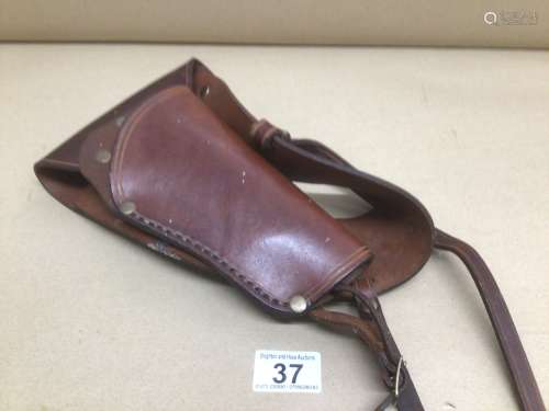 A VINTAGE LEATHER SHOULDER PISTOL HARNESS