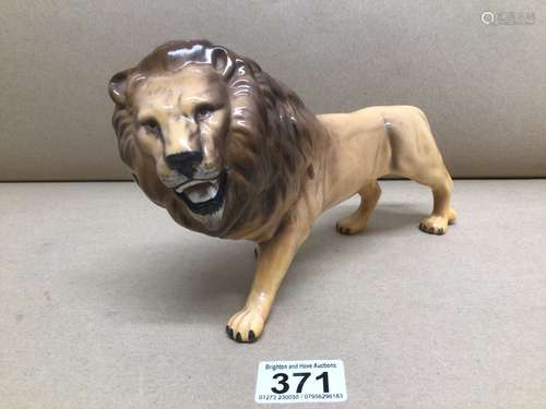 A VINTAGE BESWICK LION 24 X 15CM