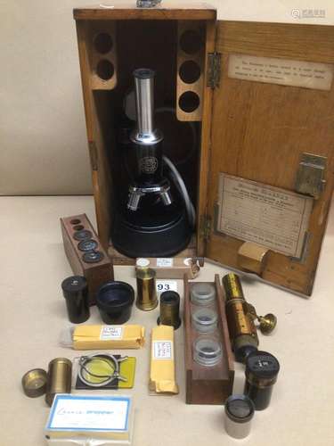 A C.BAKER OF LONDON MICROSCOPE (0503) BOXED WITH ADDITIONAL LENSES, COMPENS OCULAR, AND GLASS