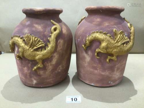 TWO POTTERY VASES WITH EMBOSSED DRAGONS TO THE SIDES 23CM