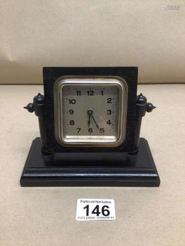 A VINTAGE WOODEN EBONISED 24 HOUR ALARM CLOCK WORKING ORDER