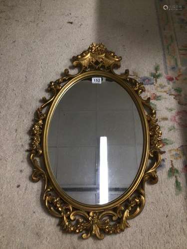 A MODERN ROCCO STYLE MIRROR 76 X 50CM